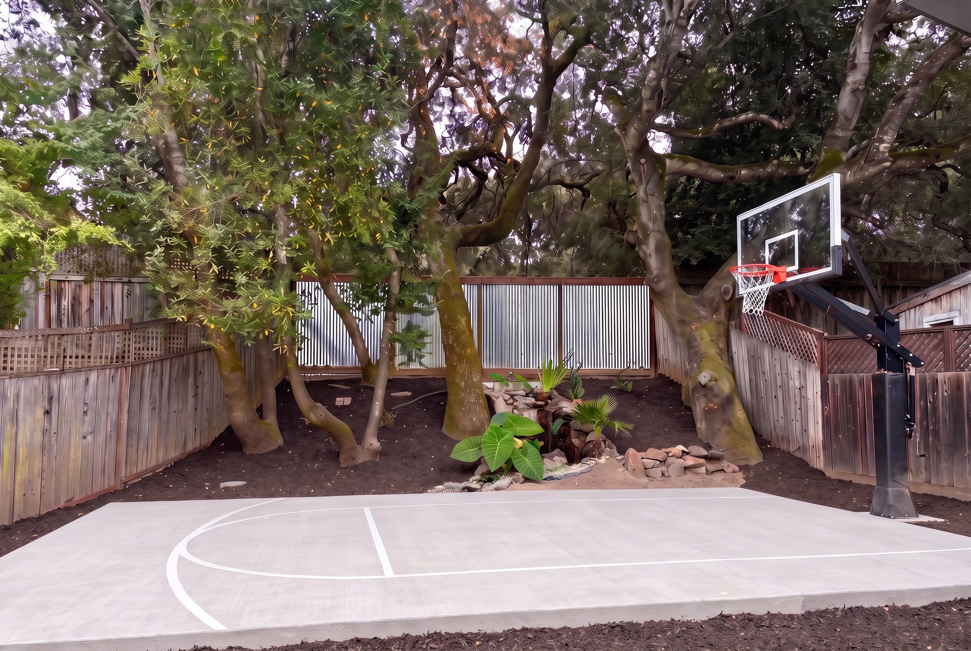 Sport court, waterfall hillside, and oak trees
